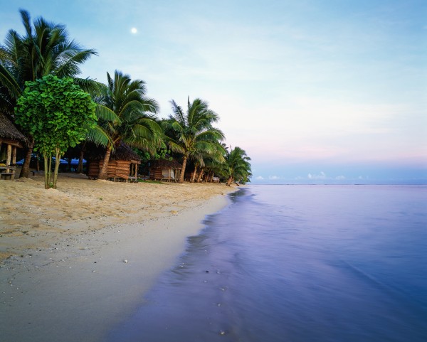 Tanu's Beach fales; Savaii Island, Samoa by PacificStock