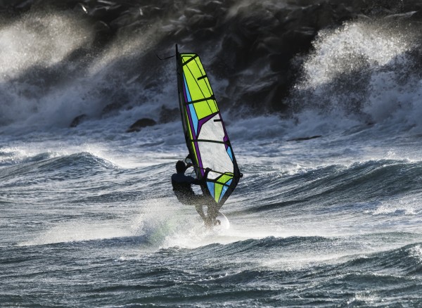 Windsurfer in the waves; Tarifa, Cadiz, Andalusia, Spain by PacificStock