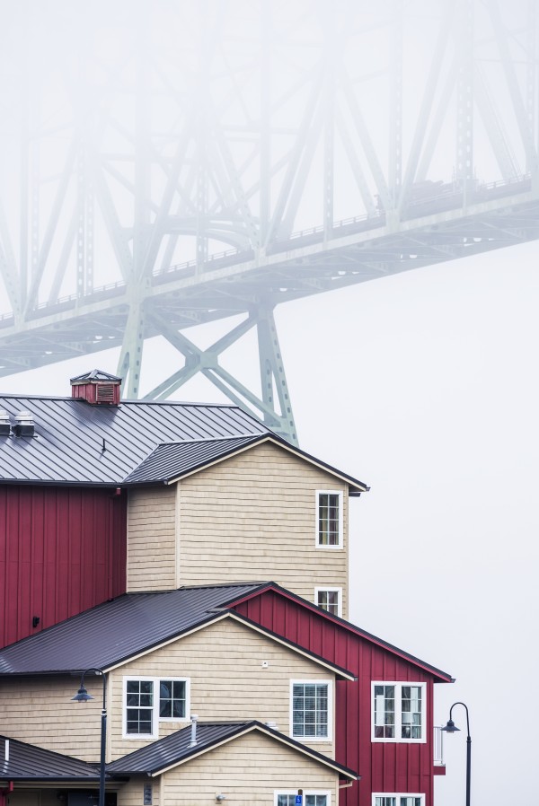 The Astoria-Megler Bridge disappears into the fog; Astoria, Oregon, United States of America by PacificStock