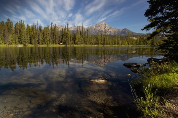 Jasper Park Lodge with Pyramid mountain in the distance, Jasper National Park; Alberta, Canada by PacificStock