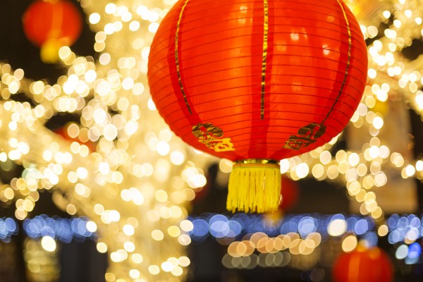 Red and gold Chinese lantern with sparkling white lights in the background, Granville Island; Vancouver, British Columbia, Canada by PacificStock