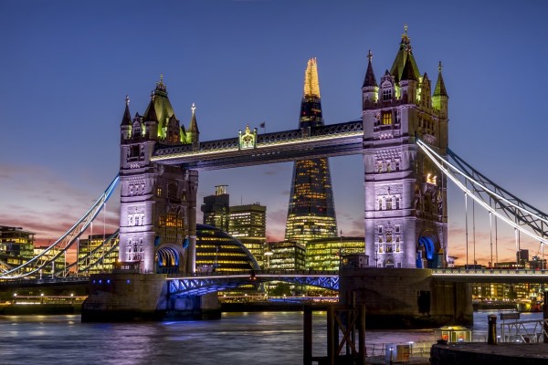 Shard with Tower Bridge at sunset; London, England by PacificStock