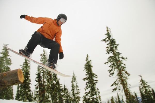 Snowboarder In Mid Air by PacificStock