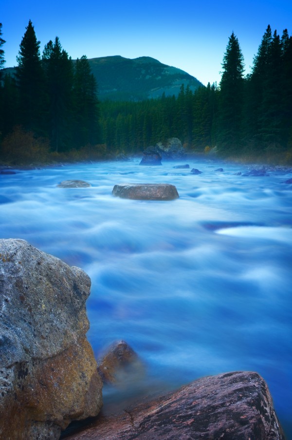 Maligne River Through The Rocky Mountains by PacificStock