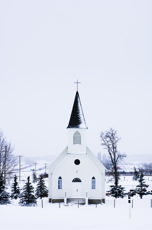 Old Fashioned Steeple Church In Winter by PacificStock