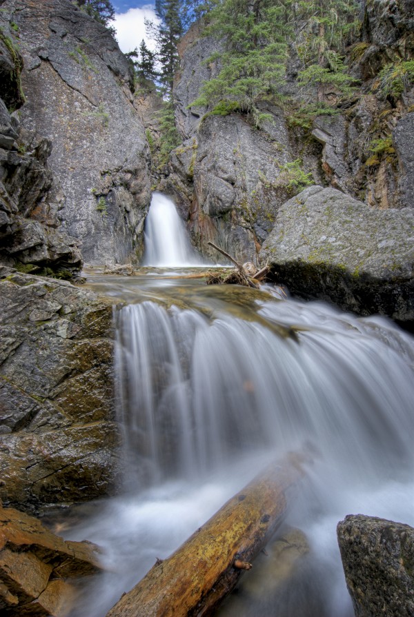 A Waterfall In Kananaskis by PacificStock