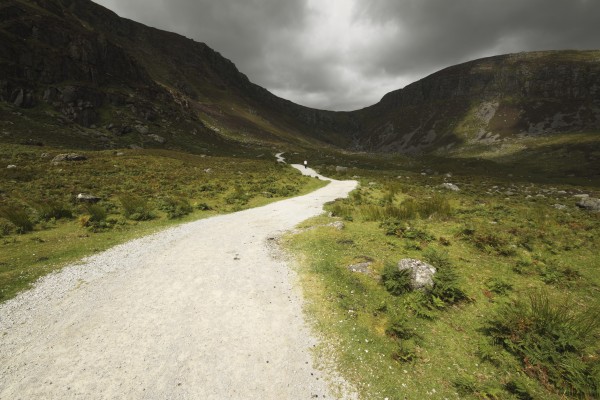 Lone Person Walking On A Path Leading Up To Mahon Falls In The Comeragh Mountains In Munster Region; County Waterford, Ireland by PacificStock