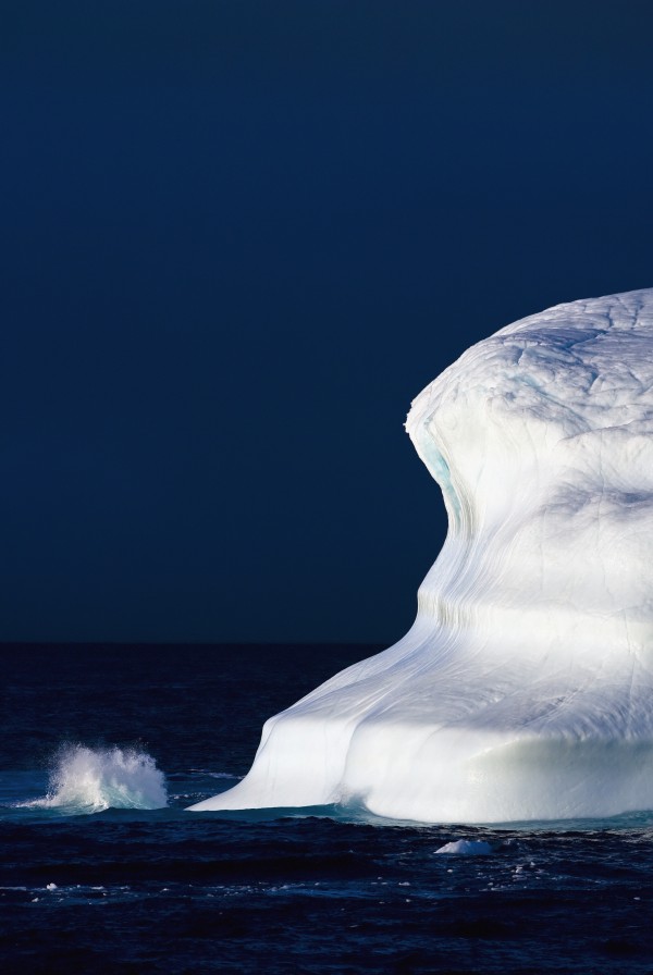 Ocean Water Splashing Against An Iceberg In The High Arctic Waters; Nunavut, Canada by PacificStock
