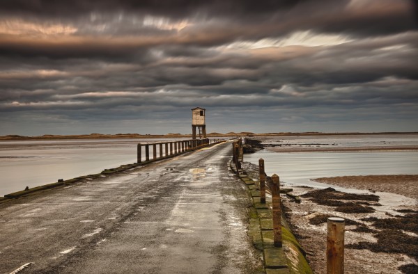 The Causeway From Holy Island; Northumberland England by PacificStock