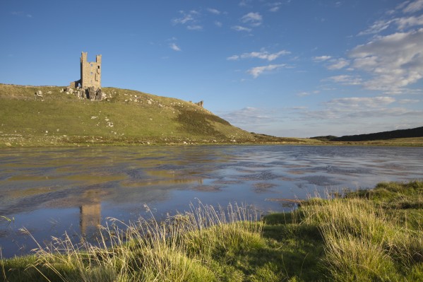 Dunstanburgh Castle; Northumberland, England by PacificStock