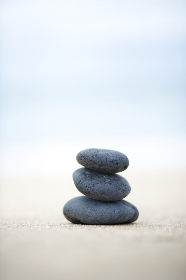 Stack Of Stones On Sand, Selective Focus. by PacificStock