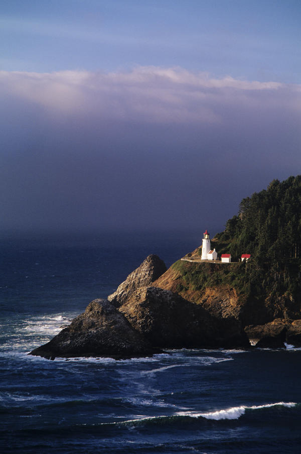 Oregon, Devils Elbow State Park, Heceta Head Lighthouse Overlooking Ocean And Waves. by PacificStock