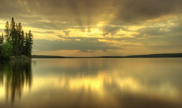 Colourful Sunrise On Waskesiu Lake In Prince Albert National Park; Saskatchewan, Canada by PacificStock