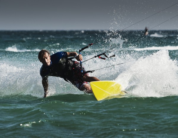 A Man Kitesurfing; Tarifa, Cadiz, Andalusia, Spain by PacificStock