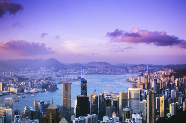 Hong Kong, Overview Of Harbor And Skyline At Twilight, Pink And Purple Sky by PacificStock