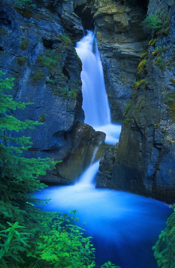 A Beautiful Waterfall, Johnston Canyon, Banff, Alberta, Canada by PacificStock