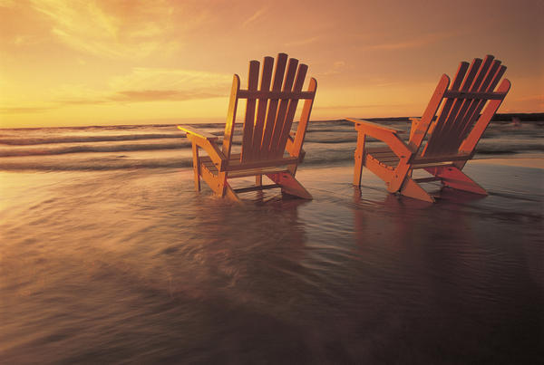 Fl5448, Dave Reede; Two Muskoka Chairs In The Surf At Grand Beach, Manitoba by PacificStock