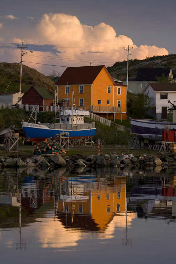 Reflection Of House In Water, Durrell, Newfoundland And Labrador by PacificStock