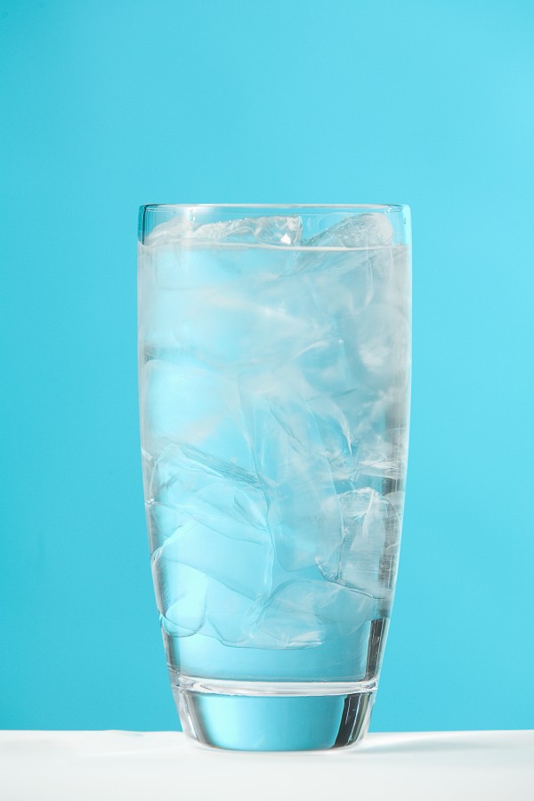 Very Full Glass Of Water With Ice by PacificStock