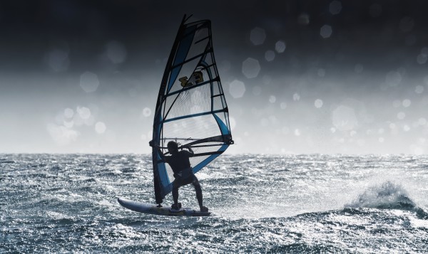 Windsurfing With Water Drops On Camera Lens; Tarifa, Cadiz, Andalusia, Spain by PacificStock