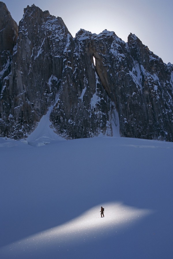 Mountaineer Pauses In Sunspot On Glacier To View Scenery, Kichatna Mtns, Denali National Park, Ak. by PacificStock