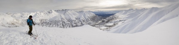 A Backcountry Skier Takes A Moment To Enjoy The View From The Top Of Hatcher Pass, Alaska by PacificStock