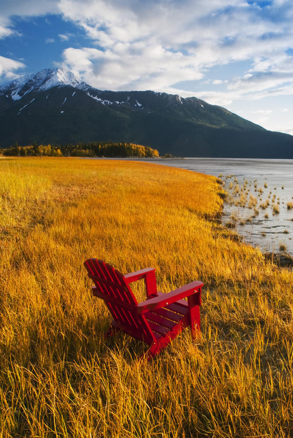 Red Adirondack Chair With Chugach Mountains In The Background Along Turnagain Arm In The Fall, Southcentral Alaska by PacificStock