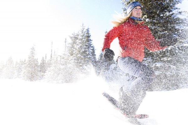 Young Woman On Snowshoes Enjoy The Outdoors Near Homer, Alaska During Winter. by PacificStock