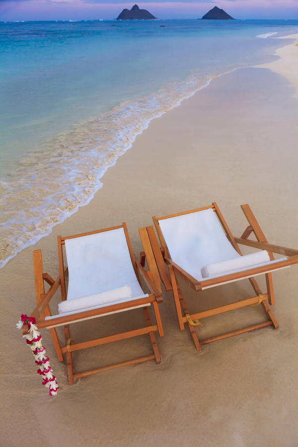 Hawaii, Oahu, Kailua, Two lounge chairs on the white sandy beach of Lanikai. by PacificStock