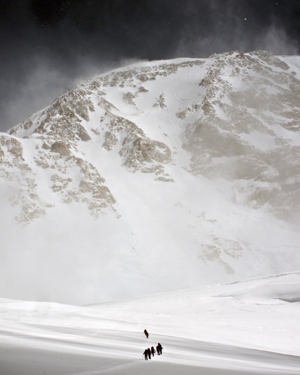View Of Climbers Traversing The Kahiltna Glacier On The West Buttress Route With The South Face Of Denali In The Background, Denali National Park And Preserve, Interior Alaska, Summer by PacificStock