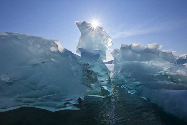 An Iceberg Floating On The Calm Waters Of Holkham Bay At The Entrance To Tracy Arm, Southeast Alaska, Autumn by PacificStock