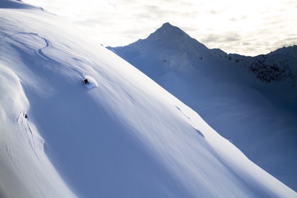 Man Backcountry Skiing In Powder Snow At Wolverine Bowl, Turnagain Pass, Kenai Mountains, Southcentral Alaska, Winter by PacificStock