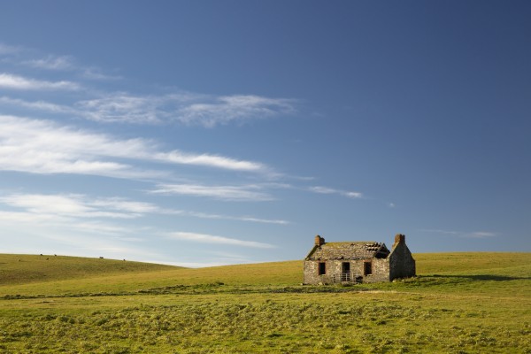 An abandoned farm building alone in the middle of a field;Dumfries and galloway scotland by PacificStock