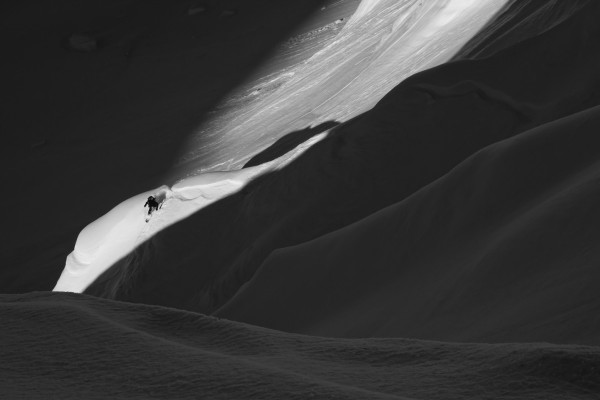 Backcountry skier splitboarding in the Tordrillo Mountains, Southcentral Alaska by PacificStock