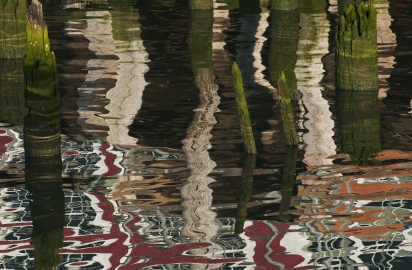 A building reflected on the Astoria waterfront; Astoria, Oregon, United States of America by PacificStock