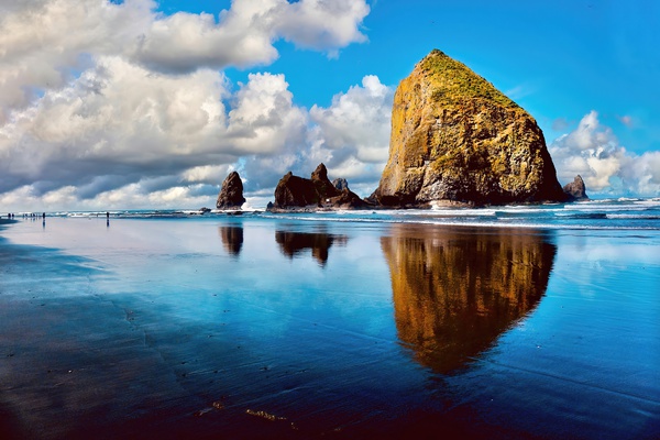 Haystack Rock Cannon Beach Oregon by Fred J Bivetto