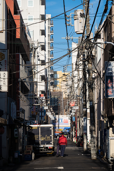Wired Morning - Tokyo Asakusa Street Scene by Matthias Hauser
