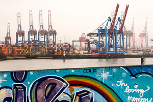 Container terminal and graffiti wall at the Elbe River in Hamburg