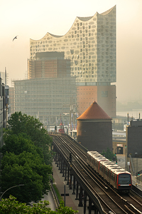 Metro line and famous Elbphilharmonie in the morning light in Hamburg 