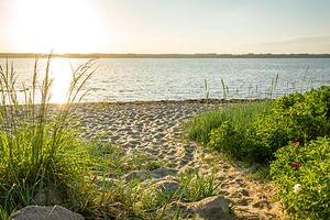 Sundown at a peaceful beach in Glücksburg at the Flensburger Förde in North Germany