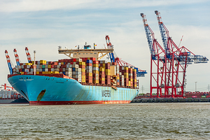Large container vessel at the Burchardkai container terminal in Hamburg Germany