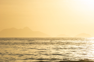 Golden sunrise over the Atlantic Ocean at Copacabana in Rio de Janeiro in Brazil