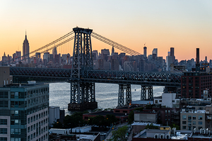 View of the Manhattan Bridge and the skyline of New York City from Williamsburg during sunset