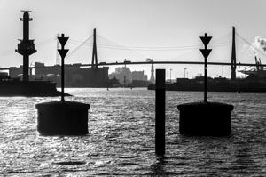 Black and white shot of harbor panorama and Köhlbrandbrücke at the Elbe River in Hamburg Germany 