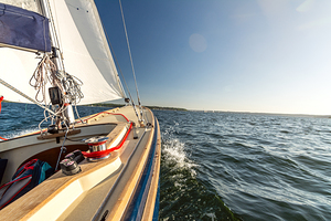View from a sailing yacht sailing on the choppy Baltic Sea on a beautiful summer day