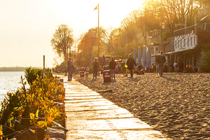 Beautiful golden sunset at the beach of the Elbe River in Hamburg 