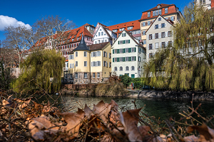 Celebrated Hölderlinturm and traditional half timbered houses at the riverfront of Tübingen Germany 