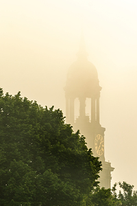 Famous church tower of the Michel in the morning fog in Hamburg 