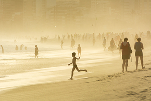 Boy enjoining the waves Ipanema Beach in Rio de Janeiro