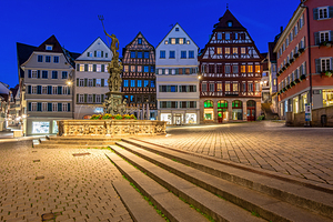 Night shot of traditional houses and fountain in the historic oldtown of Tübingen Germany